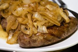 brats topped with onions