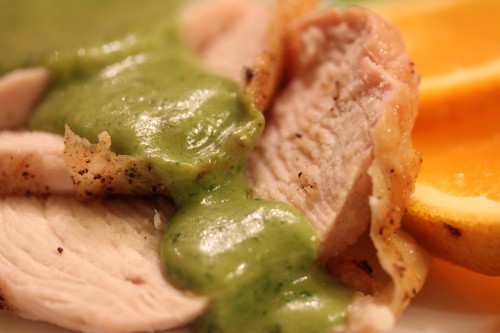 cilantro sauce on roasted turkey breast