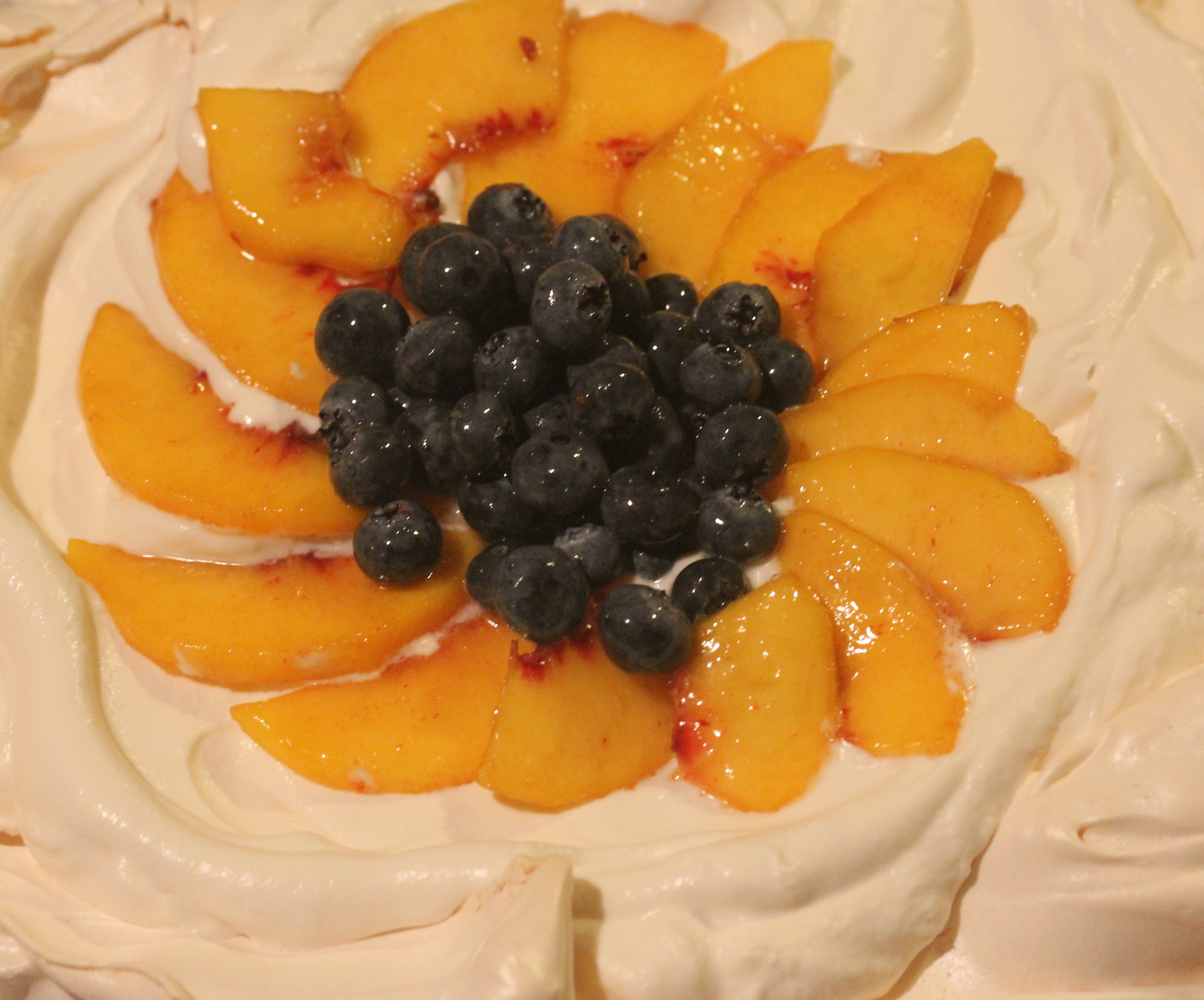 Classic Fruit Pavlova with Blueberries and Peaches or Whatever